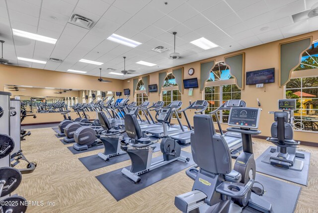 9831 Del Webb Pkwy Unit 1302, Jacksonville, FL 32256 - workout area with a drop ceiling, ceiling fan, and carpet