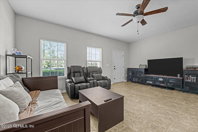 425 Oasis Ln, Orange Park, FL 32073 - living area with a ceiling fan and a textured ceiling