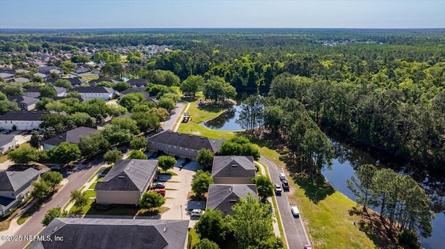 425 Oasis Ln, Orange Park, FL 32073 - drone / aerial view with a forest view, a residential view, and a water view
