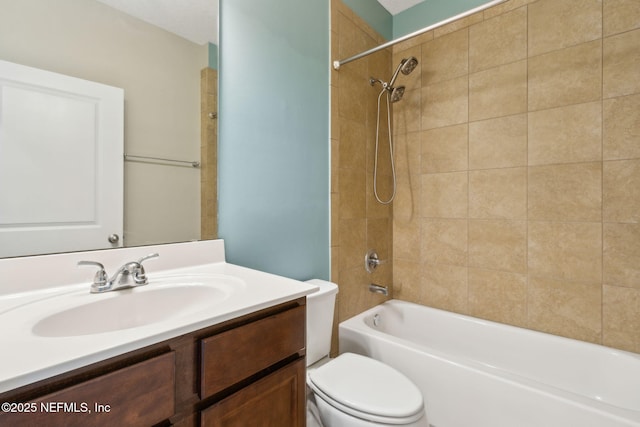 bathroom featuring shower / bath combination, vanity, and toilet