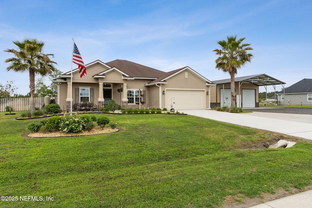 view of front of house with an attached garage, fence, driveway, and a front yard