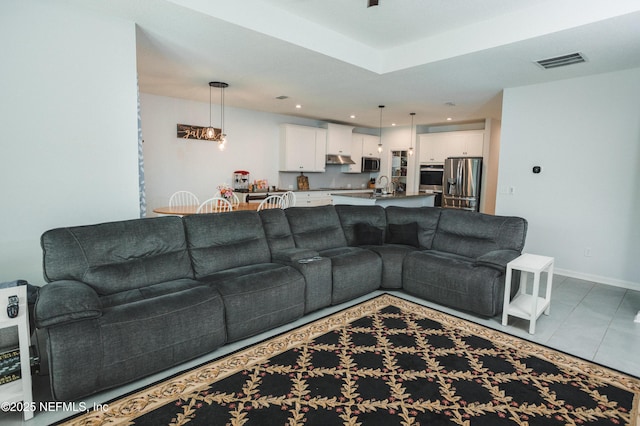 1209 Hammock Dunes Dr, Jacksonville, FL 32221 - living area with baseboards, visible vents, tile patterned flooring, and recessed lighting