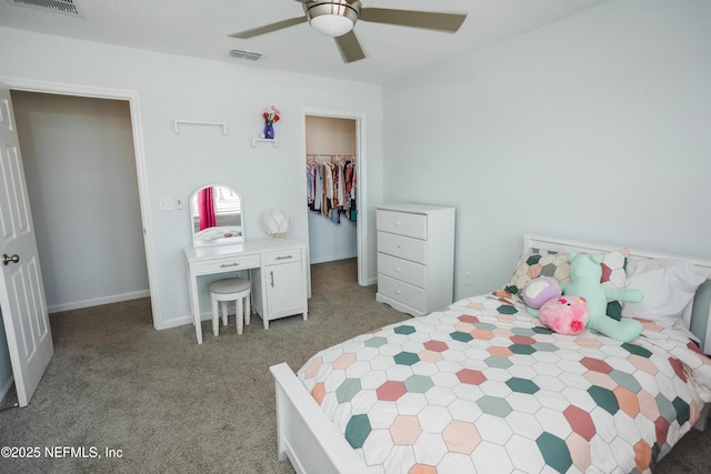 1209 Hammock Dunes Dr, Jacksonville, FL 32221 - carpeted bedroom with visible vents, ceiling fan, a spacious closet, and a closet