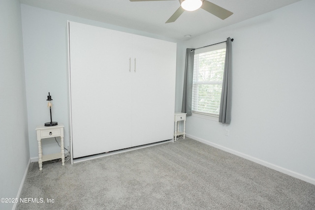 1209 Hammock Dunes Dr, Jacksonville, FL 32221 - unfurnished bedroom featuring a ceiling fan, carpet floors, and baseboards