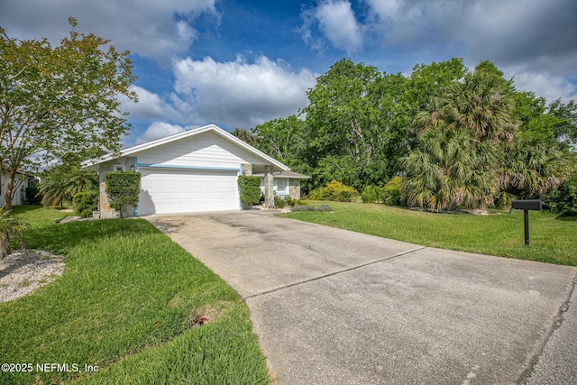 single story home with concrete driveway, a front yard, and a garage