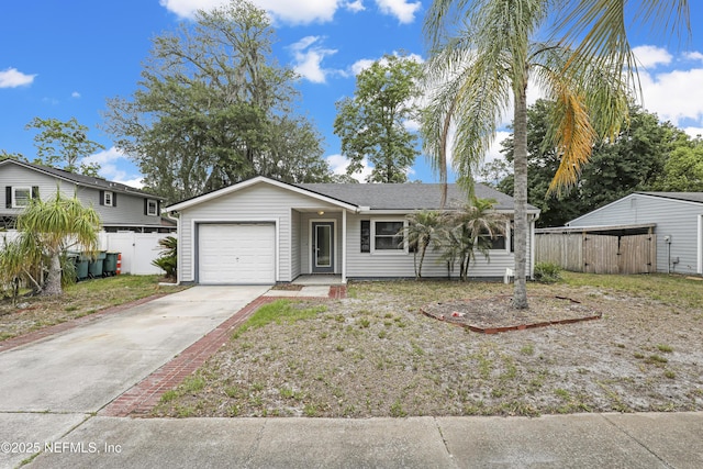 11453 Cypress Bend Ct, Jacksonville, FL 32223 - ranch-style home with concrete driveway, fence, and a garage