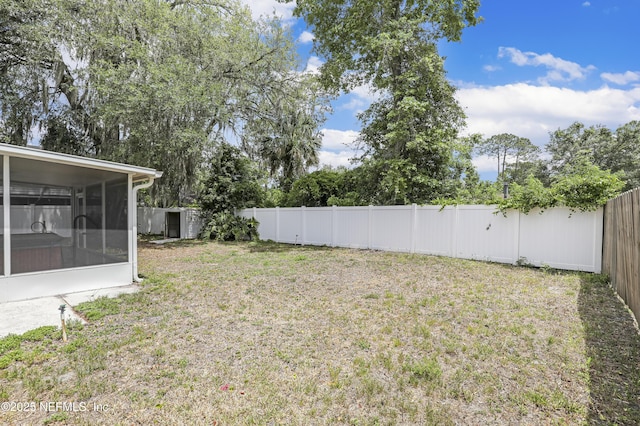 11453 Cypress Bend Ct, Jacksonville, FL 32223 - view of yard with a fenced backyard and a sunroom