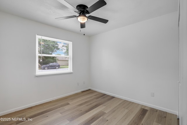 11453 Cypress Bend Ct, Jacksonville, FL 32223 - empty room featuring baseboards, a ceiling fan, and light wood finished floors