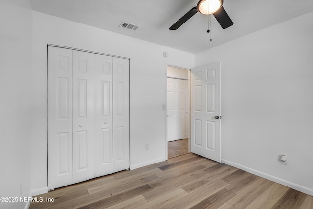 11453 Cypress Bend Ct, Jacksonville, FL 32223 - unfurnished bedroom with a closet, baseboards, visible vents, and light wood-style floors