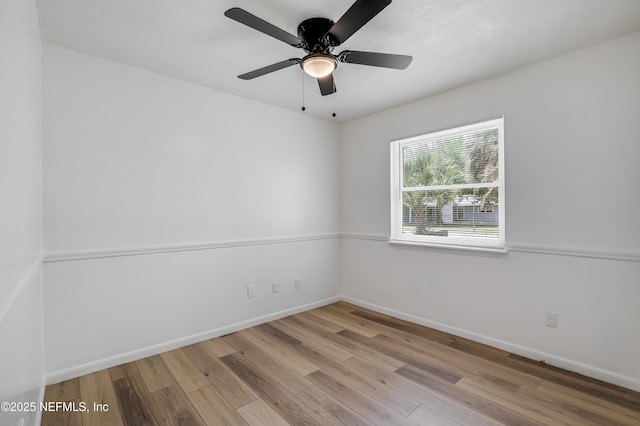 11453 Cypress Bend Ct, Jacksonville, FL 32223 - unfurnished room featuring a ceiling fan, baseboards, and wood finished floors
