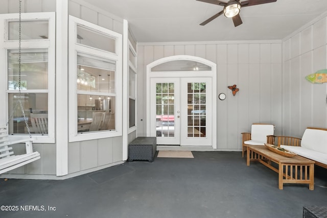 property entrance with french doors, a patio area, and a ceiling fan