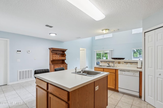 76391 Longleaf Loop, Yulee, FL 32097 - kitchen featuring white dishwasher, a sink, and visible vents