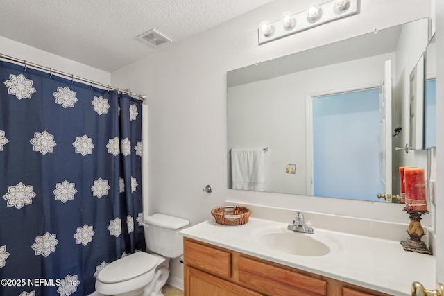 76391 Longleaf Loop, Yulee, FL 32097 - full bathroom with toilet, vanity, a textured ceiling, and visible vents