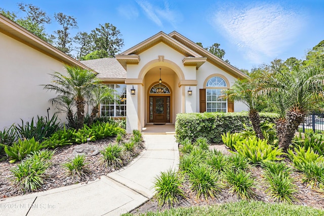 104 Twin Cedar Ct, Ponte Vedra Beach, FL 32082 - doorway to property with stucco siding