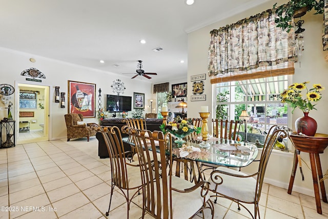 104 Twin Cedar Ct, Ponte Vedra Beach, FL 32082 - dining room with ceiling fan, visible vents, light tile patterned floors, and crown molding