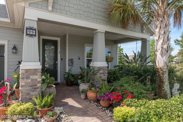 property entrance featuring covered porch