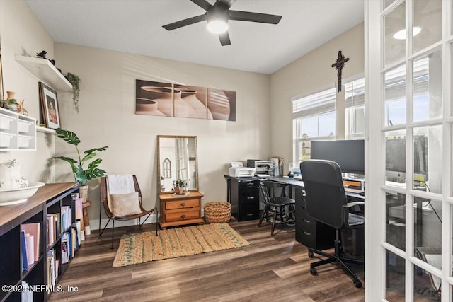 home office with a ceiling fan and wood finished floors