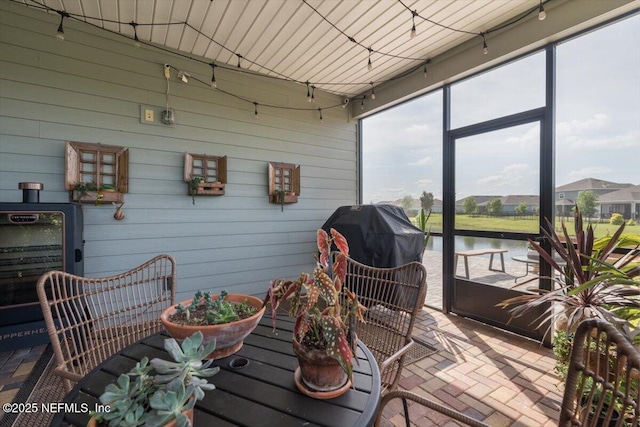 sunroom with a water view