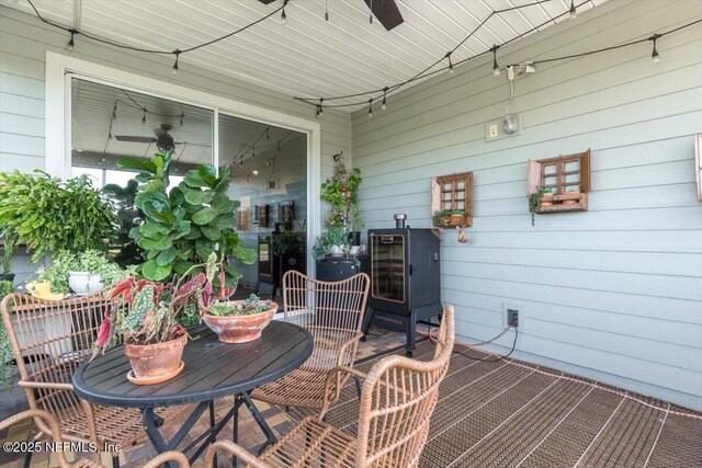 view of patio featuring ceiling fan