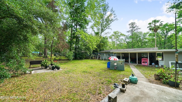 view of yard with a playground
