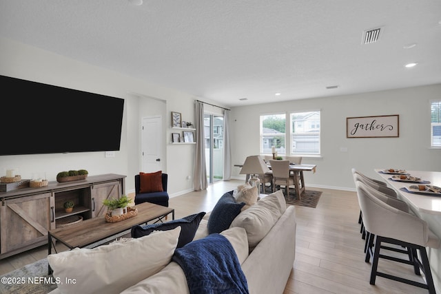 143 Bayard Pl, Jacksonville, FL 32259 - living area with light wood-style floors, baseboards, recessed lighting, and visible vents