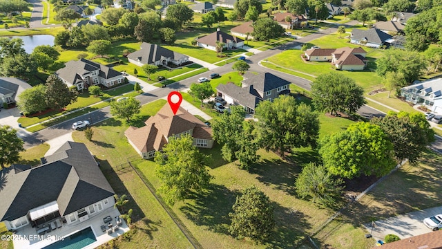 aerial view with a residential view and a water view