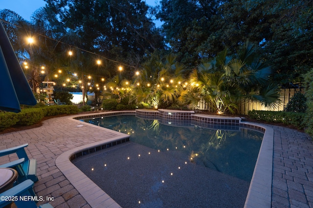pool with a patio