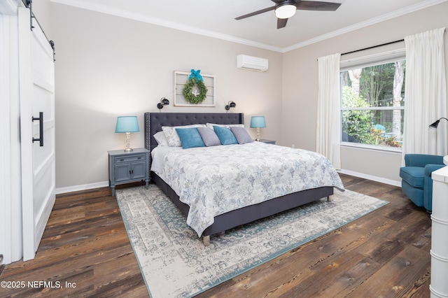 bedroom with a barn door, baseboards, ornamental molding, and dark wood-style flooring