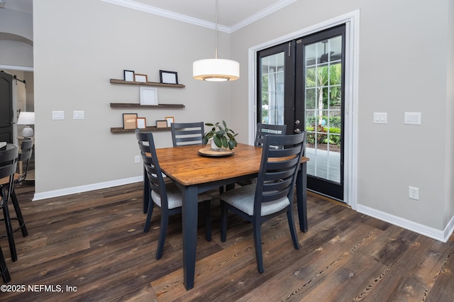 dining space with baseboards, ornamental molding, french doors, and dark wood-style flooring