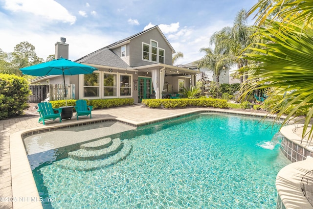 view of pool with fence, a patio area, and a fenced in pool