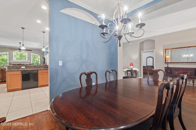 322 Cooper Bay Ct, Saint Augustine, FL 32092 - dining area featuring crown molding, recessed lighting, arched walkways, light wood-style flooring, and ceiling fan with notable chandelier