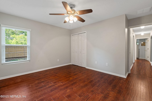322 Cooper Bay Ct, Saint Augustine, FL 32092 - unfurnished bedroom featuring baseboards, visible vents, wood finished floors, and a closet