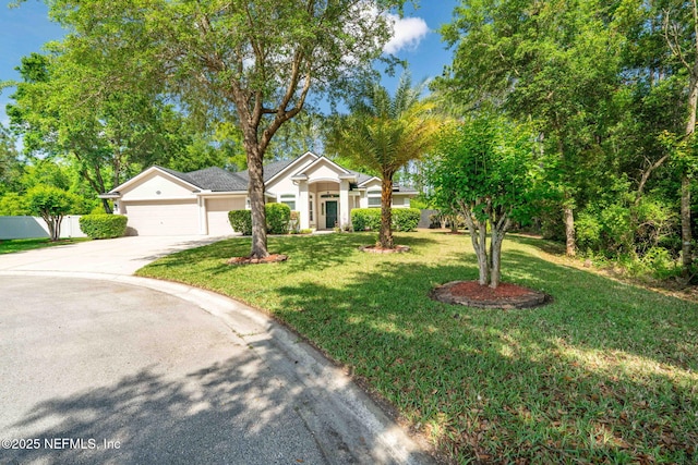 322 Cooper Bay Ct, Saint Augustine, FL 32092 - ranch-style house with driveway, a front yard, a garage, fence, and stucco siding