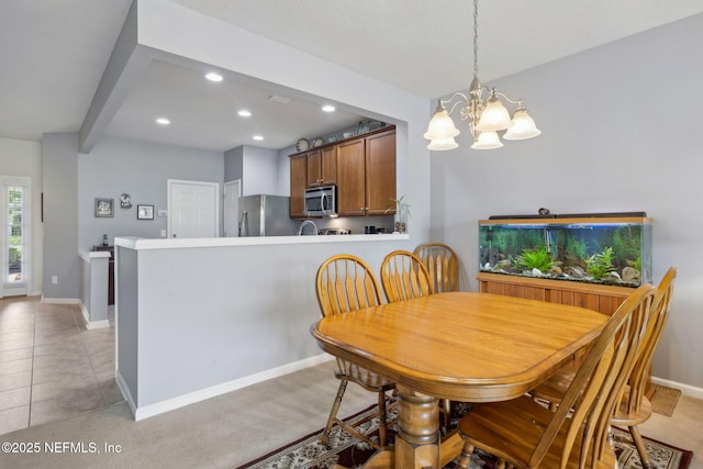 dining area featuring a notable chandelier, beam ceiling, recessed lighting, baseboards, and light tile patterned floors