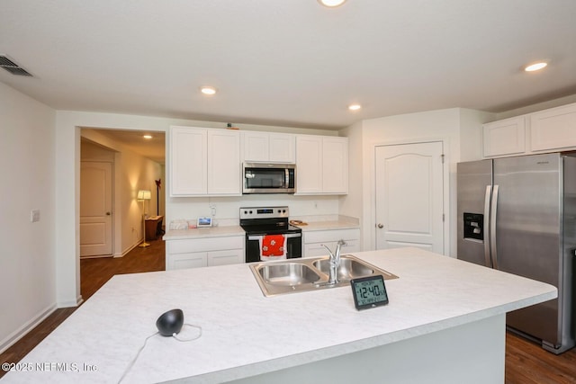 3044 Rustic Deer Way, Green Cove Springs, FL 32043 - kitchen featuring stainless steel appliances, light countertops, visible vents, a sink, and white cabinetry