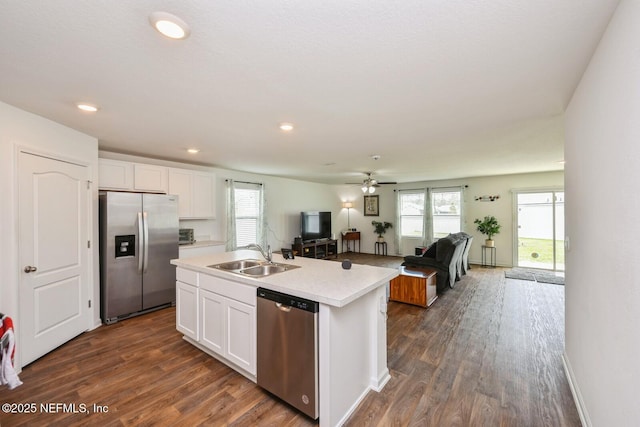 3044 Rustic Deer Way, Green Cove Springs, FL 32043 - kitchen featuring open floor plan, dark wood-style flooring, stainless steel appliances, and a sink