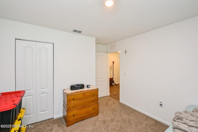 3044 Rustic Deer Way, Green Cove Springs, FL 32043 - interior space with baseboards, a closet, light colored carpet, and visible vents