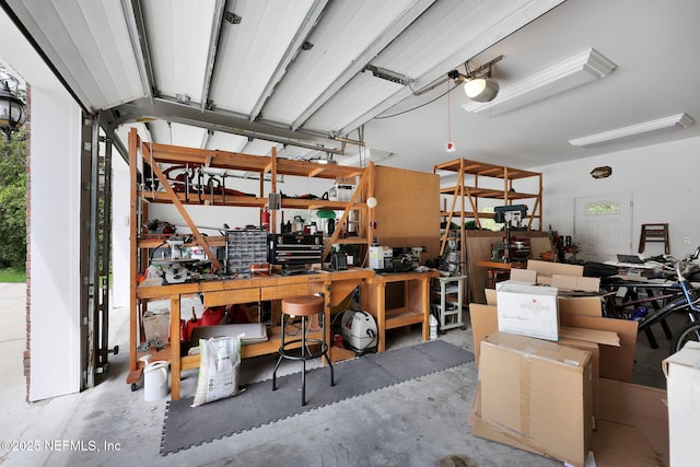 garage with a workshop area