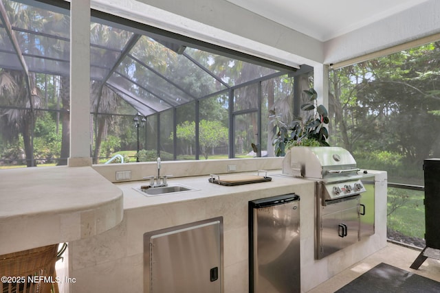 sunroom with a sink