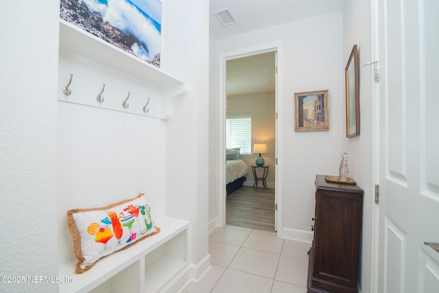 291 Whisper Rock Dr, Ponte Vedra, FL 32081 - mudroom with light tile patterned floors and baseboards