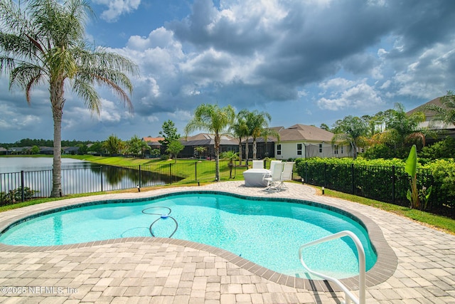 291 Whisper Rock Dr, Ponte Vedra, FL 32081 - view of swimming pool with a fenced backyard, a water view, a patio area, and a residential view
