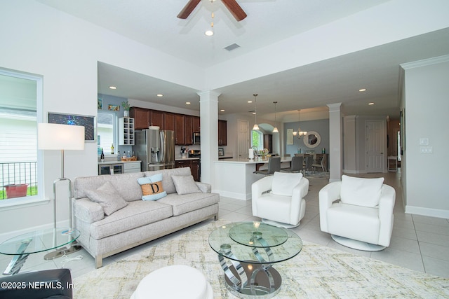291 Whisper Rock Dr, Ponte Vedra, FL 32081 - living room with ornate columns, light tile patterned floors, ceiling fan, baseboards, and recessed lighting