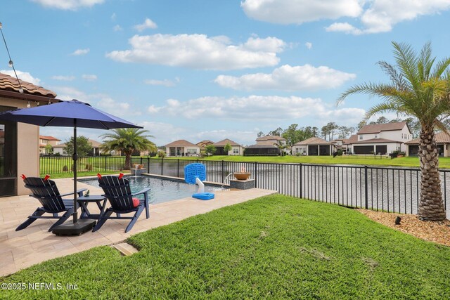 exterior space featuring a fenced backyard, a fenced in pool, a residential view, and a patio