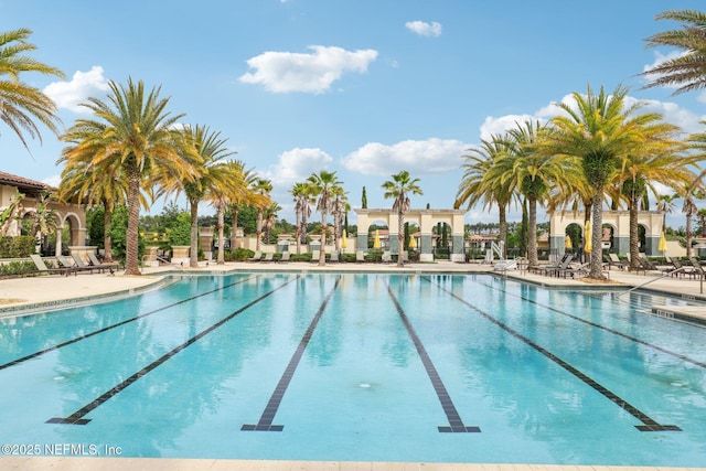 community pool with a patio