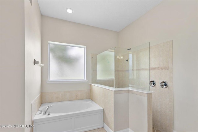 1124 Westfield Way, Saint Augustine, FL 32095 - bathroom featuring a walk in shower and a garden tub