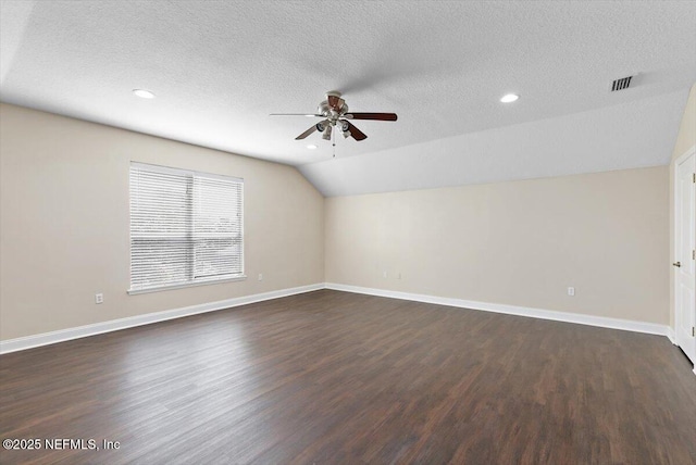 1124 Westfield Way, Saint Augustine, FL 32095 - bonus room with dark wood-style floors, a textured ceiling, ceiling fan, and vaulted ceiling
