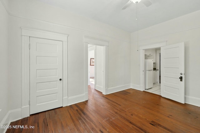 2234 Forbes St, Jacksonville, FL 32204 - spare room with wood finished floors, baseboards, and ceiling fan