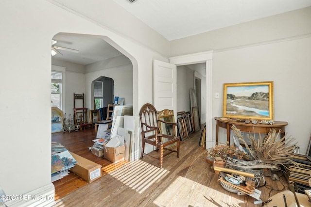 2234 Forbes St, Jacksonville, FL 32204 - dining space featuring arched walkways, wood finished floors, and a ceiling fan