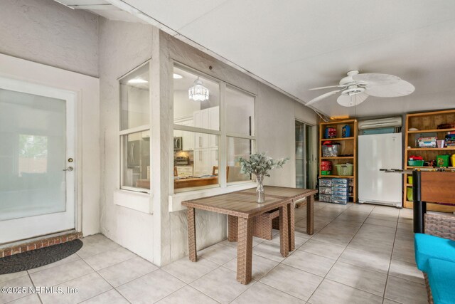 interior space featuring an AC wall unit