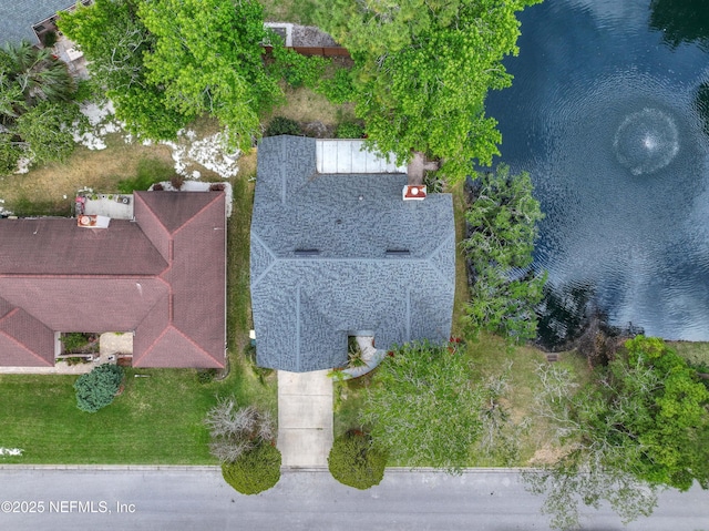 bird's eye view with a water view